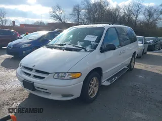 1998 Dodge Caravan LE with VIN 1B4GP54L7WB698340, listed as a IAAI auction lot 41252162 with 99,073 mi miles and . Bid and sale history available at carsss.com. Image 2.