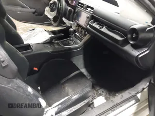 2023 Toyota 86 Premium z VIN JF1ZNBE1XP9765718, wystawiony jako IAAI lot #41945549 z przebiegiem 12 942 mil mil oraz . Historia ofert i sprzedaży dostępna na DreamBid. Obrazek 5.
