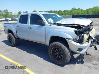 2013 Toyota Tacoma PreRunner z VIN 5TFJU4GN6DX032952, wystawiony jako IAAI lot #42001014 z przebiegiem 152 755 mil mil oraz . Historia ofert i sprzedaży dostępna na DreamBid. Obrazek 1.