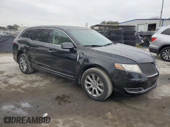 2014 Lincoln MKT with VIN 2LMHJ5FK0EBL53429, listed as a Copart auction lot 88496855 with 370,610 mi miles and Salvage Title. Bid and sale history available at DreamBid. Image 4.