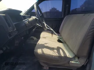 1990 Nissan Frontier with VIN 1N6SD11S9LC321876, listed as a Copart auction lot 59913575 with 119,909 mi miles and Salvage title. Bid and sale history available at DreamBid. Image 7.