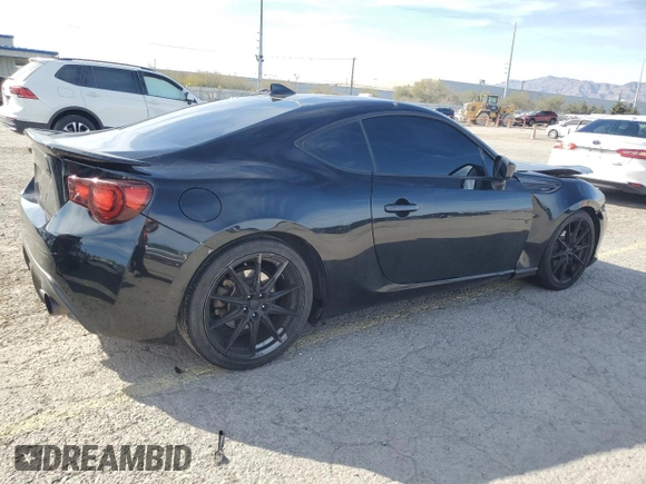 2017 Toyota 86 z VIN JF1ZNAA11H8704619, wystawiony jako Copart lot #50272835 z przebiegiem 104 096 mil mil oraz Szkoda całkowita • Salvage title. Historia ofert i sprzedaży dostępna na DreamBid. Obrazek 3.