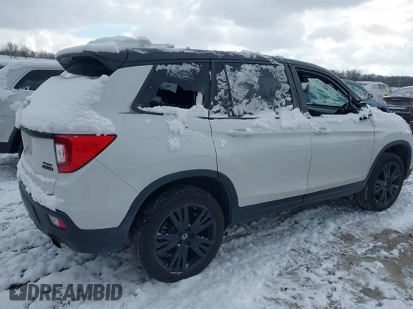 2021 Honda Passport Sport with VIN 5FNYF8H29MB009406, listed as a IAAI auction lot 41246817 with 71,997 mi miles and . Bid and sale history available at DreamBid. Image 4.