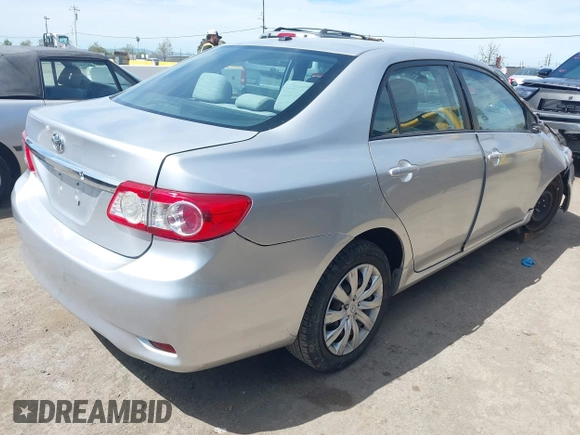 2011 Toyota Corolla L with VIN 2T1BU4EE1BC572731, listed as a IAAI auction lot 42024851 with 153,923 mi miles. Bid and sale history available at carsss.com. Image 4.