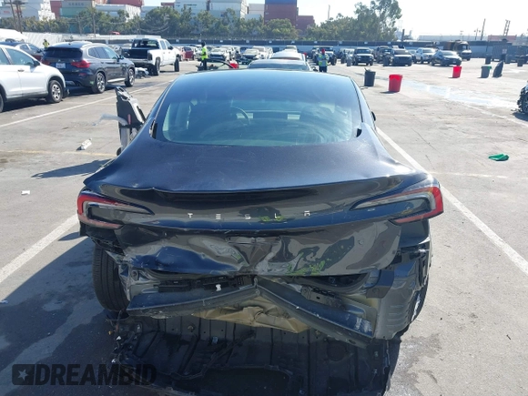 2024 Tesla Model 3 with VIN 5YJ3E1EA7RF717855, listed as a IAAI auction lot 41838814 with 8,750 mi miles and . Bid and sale history available at DreamBid. Image 16.