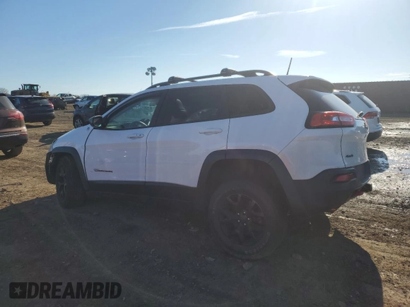 2017 Jeep Cherokee Trailhawk L Plus with VIN 1C4PJMBB3HW506965, listed as a Copart auction lot 82257594 with 106,571 mi miles and Salvage title. Bid and sale history available at DreamBid. Image 2.