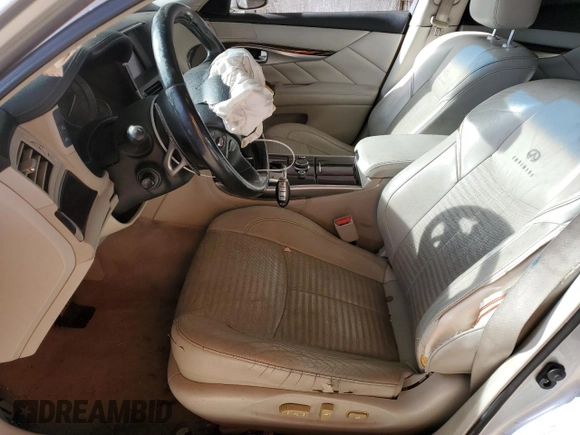 2011 Infiniti M with VIN JN1BY1APXBM324638, listed as a Copart auction lot 51014985 with 194,447 mi miles and Salvage title. Bid and sale history available at DreamBid. Image 7.