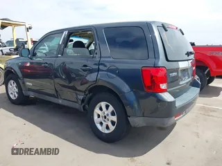 2008 Mazda Tribute ES with VIN 4F2CZ06188KM01024, listed as a IAAI auction lot 41890148 with 122,367 mi miles. Bid and sale history available at carsss.com. Image 6.