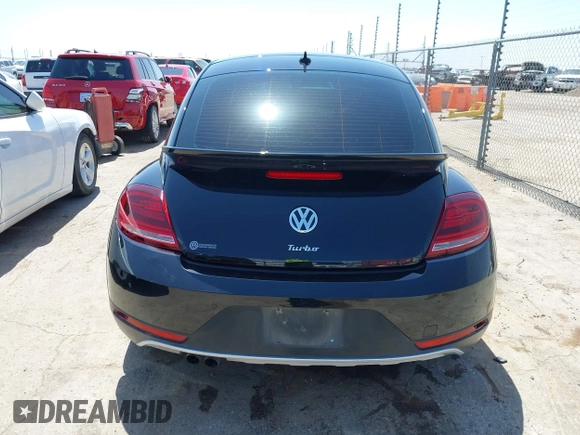 2018 Volkswagen Beetle Dune with VIN 3VWSD7AT1JM702354, listed as a IAAI auction lot 41993527 with 50,952 mi miles and . Bid and sale history available at DreamBid. Image 16.