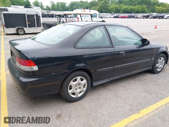 1999 Honda Civic EX z VIN 1HGEJ8241XL068738, wystawiony jako IAAI lot #42568778 z przebiegiem 202 590 mil mil oraz . Historia ofert i sprzedaży dostępna na DreamBid. Obrazek 4.