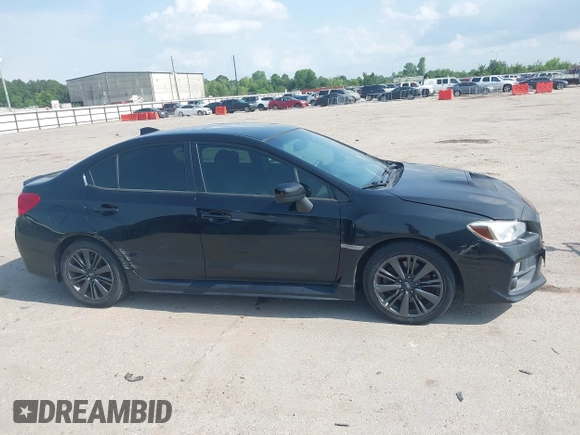 2015 Subaru WRX Premium with VIN JF1VA1D66F9819337, listed as a IAAI auction lot 42452261 with 56,673 mi miles and . Bid and sale history available at DreamBid. Image 13.