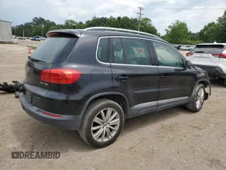 2013 Volkswagen Tiguan SE z VIN WVGAV7AXXDW523728, wystawiony jako Copart lot #64116173 z przebiegiem 116 336 mil mil oraz Szkoda całkowita • Salvage title. Historia ofert i sprzedaży dostępna na DreamBid. Obrazek 3.