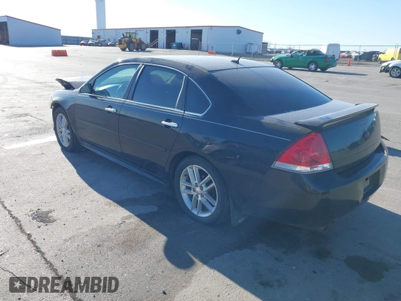 2013 Chevrolet Impala LTZ with VIN 2G1WC5E3XD1237776, listed as a IAAI auction lot 42023033 with 143,279 mi miles and . Bid and sale history available at DreamBid. Image 3.