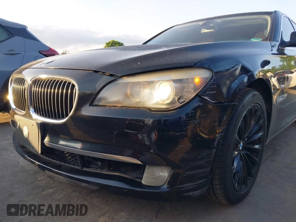 2011 BMW 7 Series 740i z VIN WBAKA4C5XBC612953, wystawiony jako IAAI lot #42144964 z przebiegiem 158 898 mil mil oraz . Historia ofert i sprzedaży dostępna na DreamBid. Obrazek 6.