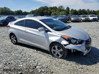 2013 Hyundai Elantra Coupe GS with VIN KMHDH6AE5DU023419, listed as a Copart auction lot 70173704 with 170,141 mi miles and Salvage Title. Bid and sale history available at carsss.com. Image 4.