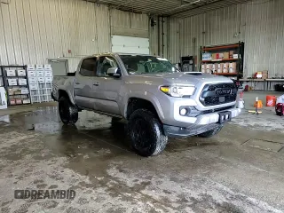 2020 Toyota Tacoma SR5 z VIN 5TFCZ5AN7LX222217, wystawiony jako Copart lot #45892765 z przebiegiem 79 098 mil mil oraz Szkoda całkowita • Salvage title. Historia ofert i sprzedaży dostępna na DreamBid. Obrazek 14.