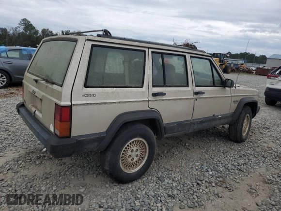 1995 Jeep Cherokee Sport with VIN 1J4FJ68S4SL618773, listed as a Copart auction lot 74126954 with 318,519 mi miles and Salvage title. Bid and sale history available at DreamBid. Image 3.