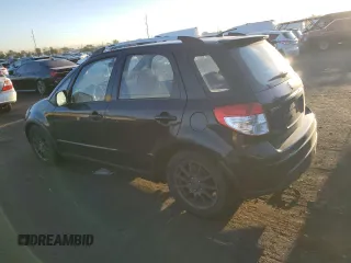 2009 Suzuki SX4 Man Touring Pkg AWD with VIN JS2YB417195101117, listed as a Copart auction lot 71102744 with 137,707 mi miles and Salvage Title. Bid and sale history available at carsss.com. Image 2.