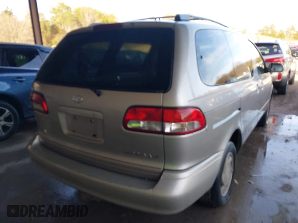 2002 Toyota Sienna LE with VIN 4T3ZF13C72U422993, listed as a IAAI auction lot 41552421 with 260,014 mi miles. Bid and sale history available at carsss.com. Image 4.