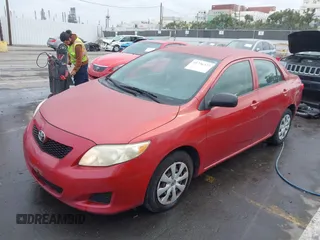2009 Toyota Corolla with VIN JTDBL40E099075020, listed as a IAAI auction lot 41736322 with 211,111 mi miles. Bid and sale history available at carsss.com. Image 2.
