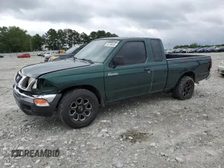 2000 Nissan Frontier XE with VIN 1N6DD26SXYC400648, listed as a Copart auction lot 58756855 with 148,051 mi miles and Salvage title. Bid and sale history available at DreamBid. Image 1.