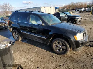 2006 Jeep Grand Cherokee Overland with VIN 1J8HR68256C334929, listed as a Copart auction lot 79450964 with 184,944 mi miles and Salvage Title. Bid and sale history available at carsss.com. Image 4.