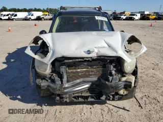 2011 MINI Countryman with VIN WMWZB3C59BWH94541, listed as a Copart auction lot 87177514 with 186,979 mi miles and Salvage title. Bid and sale history available at DreamBid. Image 5.