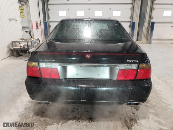 2002 Cadillac Seville Touring STS with VIN 1G6KY54962U158476, listed as a Copart auction lot 86624774 with 77,818 mi miles and Salvage Title. Bid and sale history available at carsss.com. Image 6.