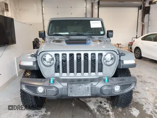 2021 Jeep Wrangler Unlimited Rubicon z VIN 1C4JJXR65MW675010, wystawiony jako IAAI lot #41990021 z przebiegiem 73 406 mil mil oraz . Historia ofert i sprzedaży dostępna na DreamBid. Obrazek 12.