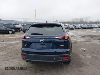 2021 Mazda CX-9 Touring z VIN JM3TCBCY4M0520362, wystawiony jako IAAI lot #41193396 z przebiegiem 17 323 mil mil oraz . Historia ofert i sprzedaży dostępna na DreamBid. Obrazek 16.