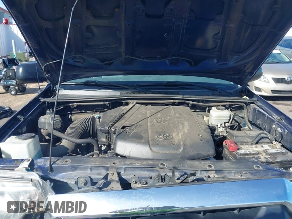 2015 Toyota Tacoma with VIN 3TMLU4ENXFM177755, listed as a IAAI auction lot 41867145 with 123,551 mi miles and . Bid and sale history available at DreamBid. Image 10.