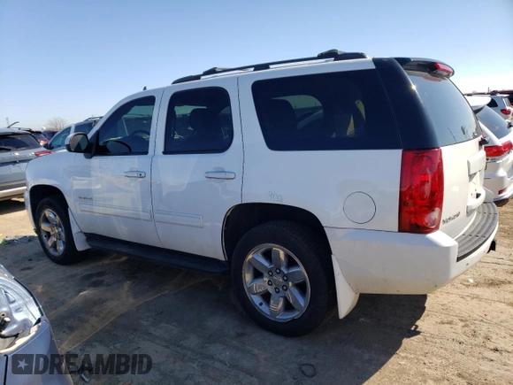 2013 GMC Yukon SLT with VIN 1GKS2CE01DR306482, listed as a Copart auction lot 45743624 with 173,117 mi miles and Salvage Title. Bid and sale history available at carsss.com. Image 2.