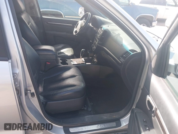 2007 Hyundai Santa Fe SE z VIN 5NMSH73E07H125656, wystawiony jako IAAI lot #42121738 z przebiegiem 171 463 mil mil oraz . Historia ofert i sprzedaży dostępna na DreamBid. Obrazek 5.