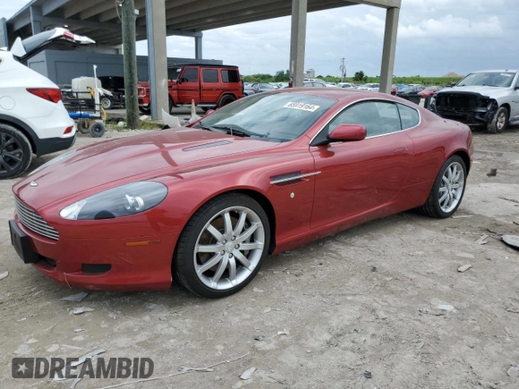 2005 Aston Martin DB9 z VIN SCFAD01A15GA00012, wystawiony jako Copart lot #65919164 z przebiegiem Nie podano mil oraz Szkody całkowita. Historia ofert i sprzedaży dostępna na DreamBid. Obrazek 1.