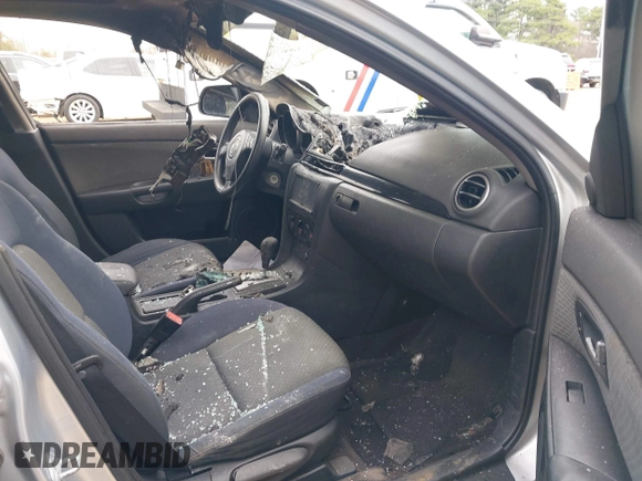 2004 Mazda 3 i with VIN JM1BK12F041158011, listed as a IAAI auction lot 41676950 with Not Provided miles and . Bid and sale history available at DreamBid. Image 5.