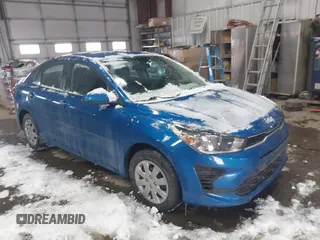 2022 Kia Rio S with VIN 3KPA24AD9NE468203, listed as a IAAI auction lot 41595984 with 51,398 mi miles. Bid and sale history available at carsss.com. Image 1.
