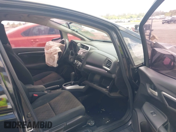 2016 Honda Fit LX with VIN JHMGK5H58GX002388, listed as a IAAI auction lot 41957350 with 127,211 mi miles. Bid and sale history available at carsss.com. Image 5.