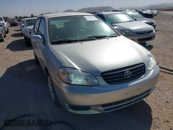 2004 Toyota Corolla CE with VIN 1NXBR32E64Z283247, listed as a IAAI auction lot 42121254 with 292,754 mi miles. Bid and sale history available at carsss.com. Image 6.