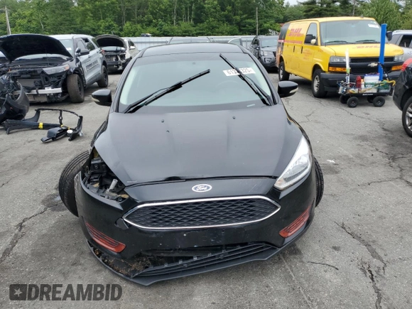 2016 Ford Focus SE with VIN 1FADP3F20GL303902, listed as a Copart auction lot 61374325 with 149,265 mi miles and Salvage title. Bid and sale history available at DreamBid. Image 5.