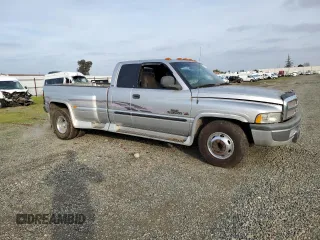 2001 Dodge Ram 3500 with VIN 1B7MC33W71J574245, listed as a Copart auction lot 84877774 with 200,945 mi miles and Salvage Title. Bid and sale history available at carsss.com. Image 4.