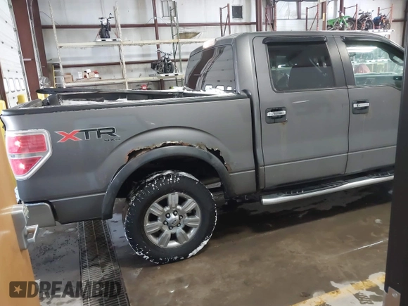 2011 Ford F-150 XLT with VIN 1FTFW1ET4BFB50467, listed as a IAAI auction lot 41608114 with 201,858 mi miles. Bid and sale history available at carsss.com. Image 4.