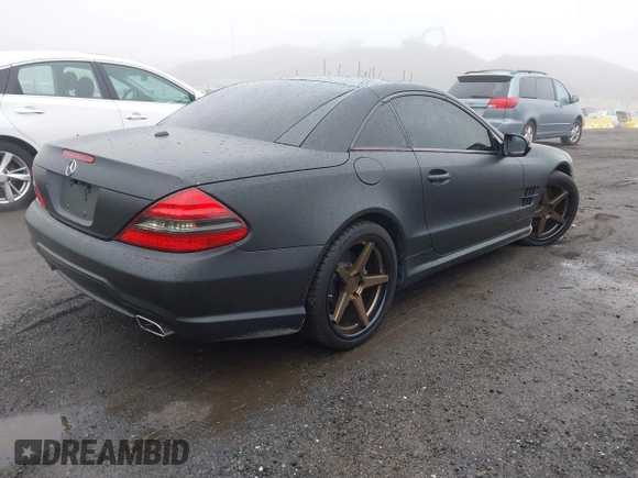 2011 Mercedes-Benz SL 550 with VIN WDBSK7BA0BF164803, listed as a IAAI auction lot 42495147 with 63,616 mi miles and . Bid and sale history available at DreamBid. Image 4.