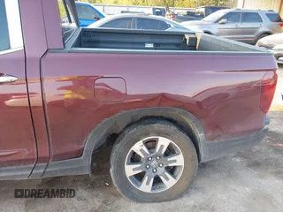 2017 Honda Ridgeline RTL-E with VIN 5FPYK3F74HB029959, listed as a IAAI auction lot 40530840 with 95,596 mi miles and . Bid and sale history available at DreamBid. Image 6.