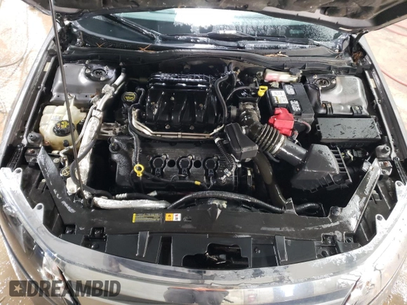 2012 Ford Fusion SE z VIN 3FAHP0HG5CR392483, wystawiony jako Copart lot #48069745 z przebiegiem 155 171 mil mil oraz Szkoda całkowita • Salvage title. Historia ofert i sprzedaży dostępna na DreamBid. Obrazek 11.