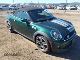 2012 MINI Roadster S with VIN WMWSY3C59CT144205, listed as a IAAI auction lot 41675704 with 79,636 mi miles and . Bid and sale history available at DreamBid. Image 1.