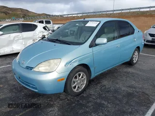2002 Toyota Prius with VIN JT2BK18U020064521, listed as a IAAI auction lot 41712156 with 221,517 mi miles. Bid and sale history available at carsss.com. Image 2.