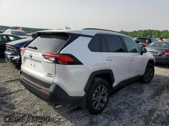2024 Toyota RAV4 Hybrid XLE Premium with VIN 4T3B6RFV1RU174487, listed as a Copart auction lot 57208645 with 9,911 mi miles and Salvage title. Bid and sale history available at DreamBid. Image 3.