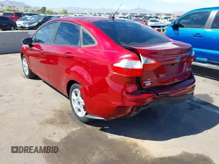 2015 Ford Fiesta SE with VIN 3FADP4BJ4FM149307, listed as a IAAI auction lot 42078091 with 124,529 mi miles. Bid and sale history available at carsss.com. Image 3.