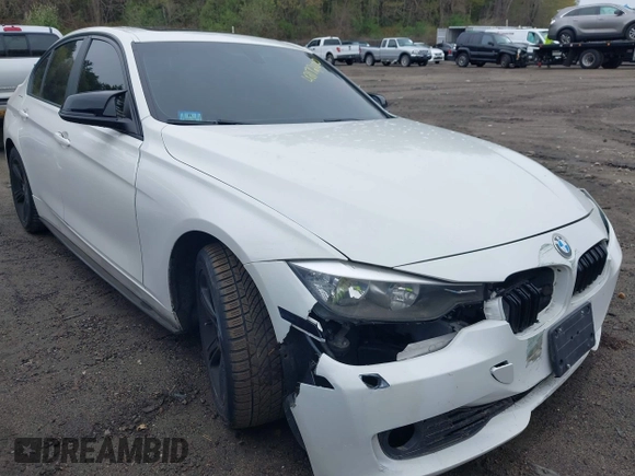2014 BMW 3 Series 328i xDrive with VIN WBA3B5C56EP544400, listed as a IAAI auction lot 42172100 with 242,472 mi miles. Bid and sale history available at carsss.com. Image 1.