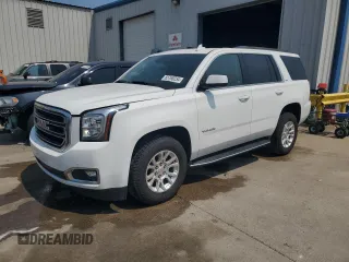 2020 GMC Yukon SLT with VIN 1GKS1BKC0LR243224, listed as a Copart auction lot 65768234 with 129,702 mi miles and Salvage Title. Bid and sale history available at carsss.com. Image 1.